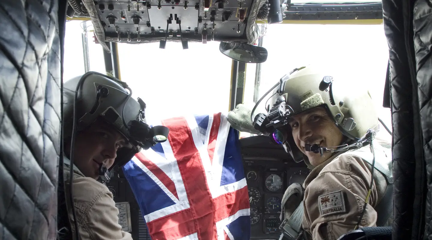 Pilots Major Jason Duggan (left) and Captain Jason Otter, C Squadron, 5th Aviation Regiment in the cockpit of Chinook A15-201