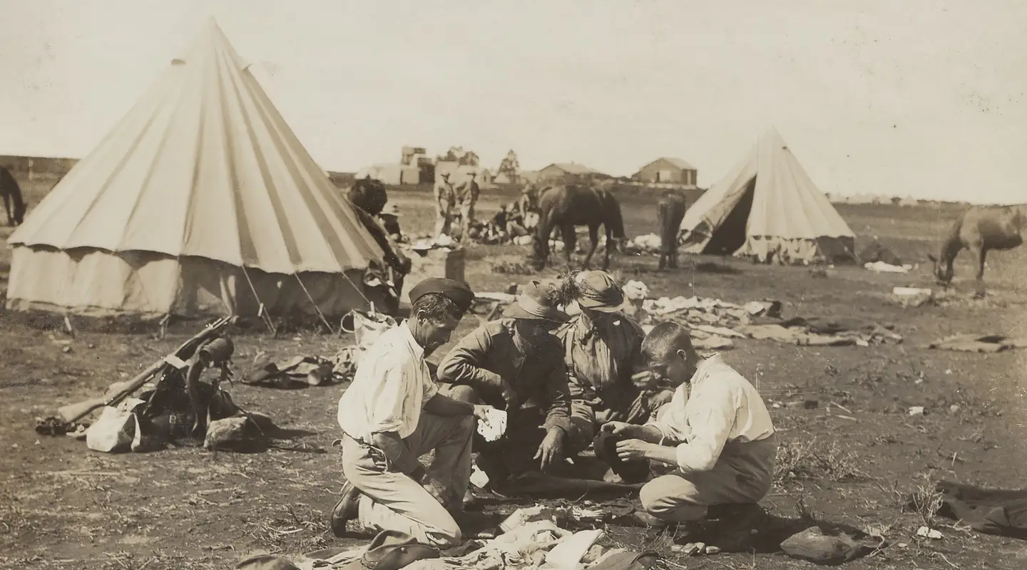 Queensland Mounted Infantry drying their kit after a storm, Belmont, South Africa, c. 1900.