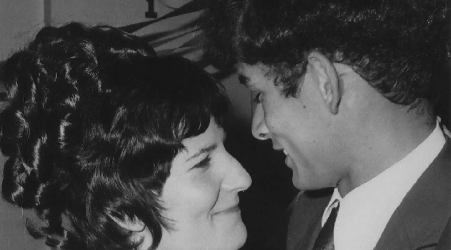 Angela and her husband dancing