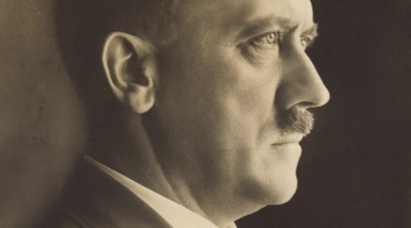 Side profile portrait of Adolf Hitler.