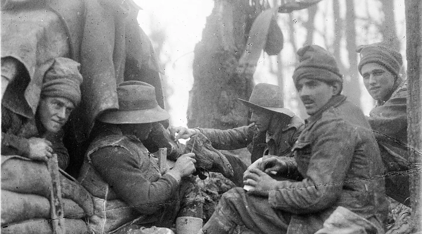 Australians cleaning off mud, France, December 1916