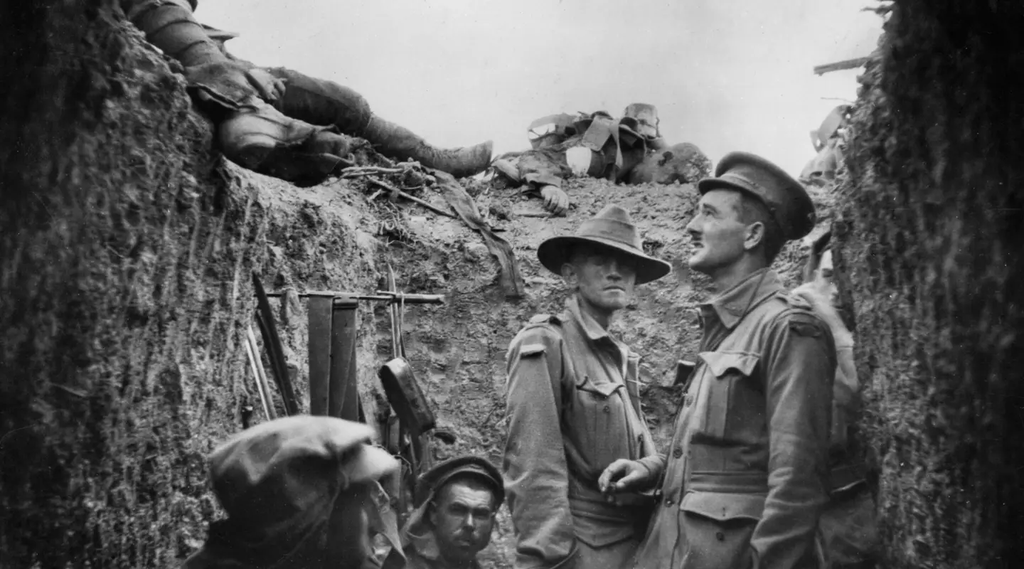 In a captured trench at Lone Pine, Major Leslie Morshead (right) looks at Australian and Turkish dead lying on top of the parapet.