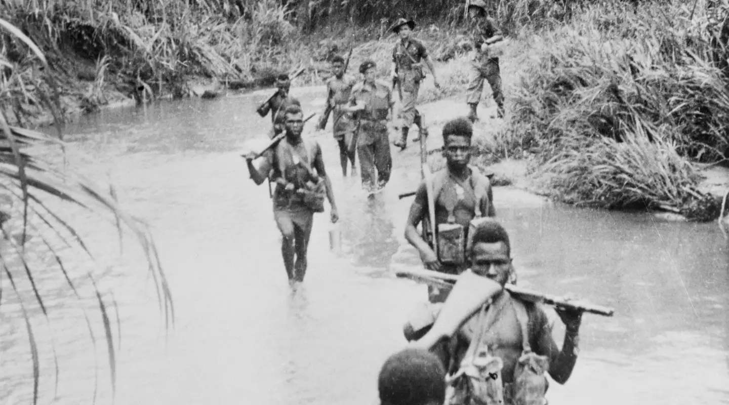 New Guinea Infantry Battalion troops on their way to attack the village of Gisananbu 1945