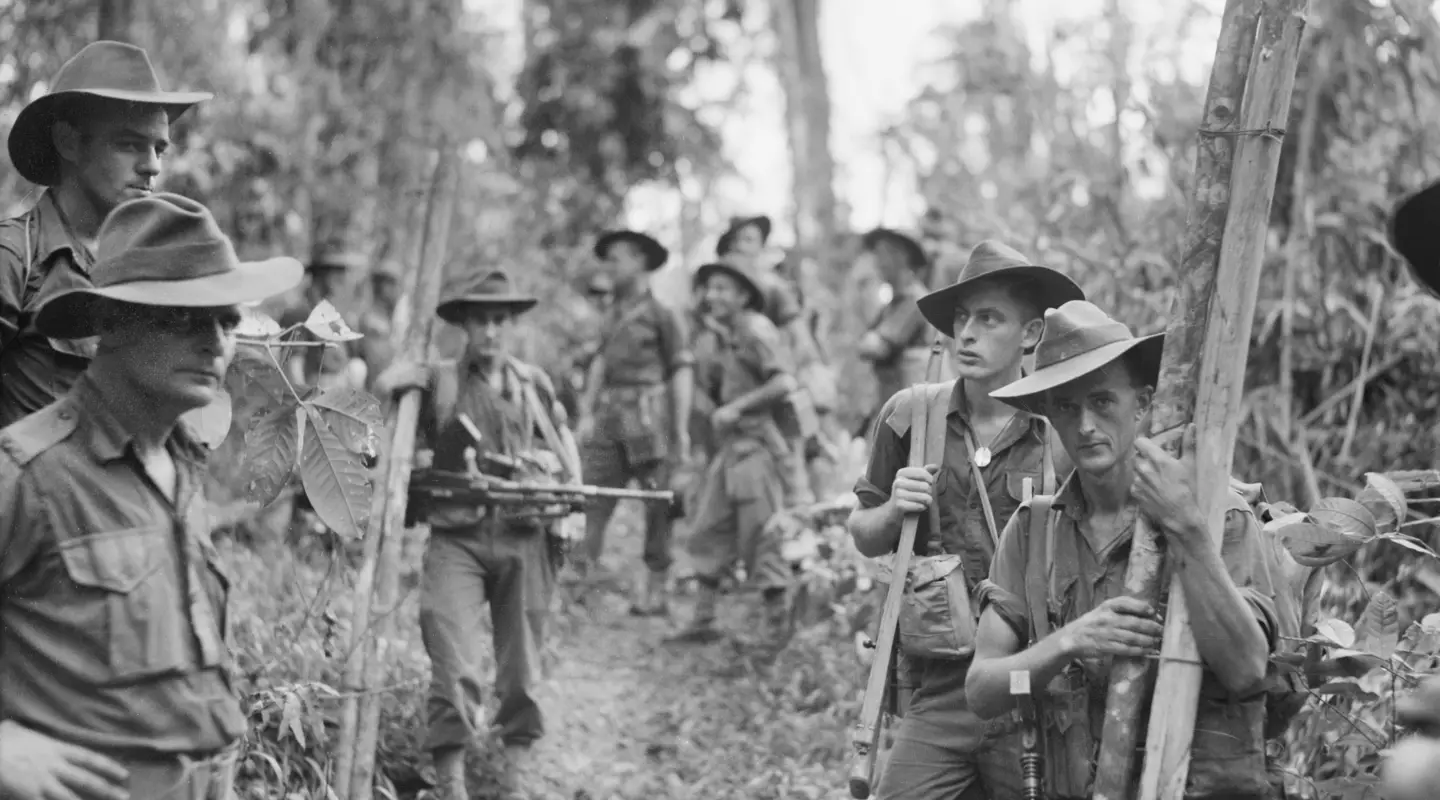 Soldiers of the 2/8th Battalion prepare to attack Japanese defences on Mount Shiburangu, near Wewak in June 1945
