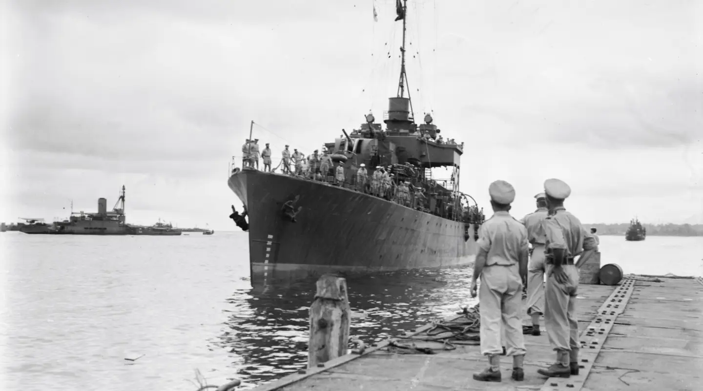 HMAS Diamantina pulling into the wharf