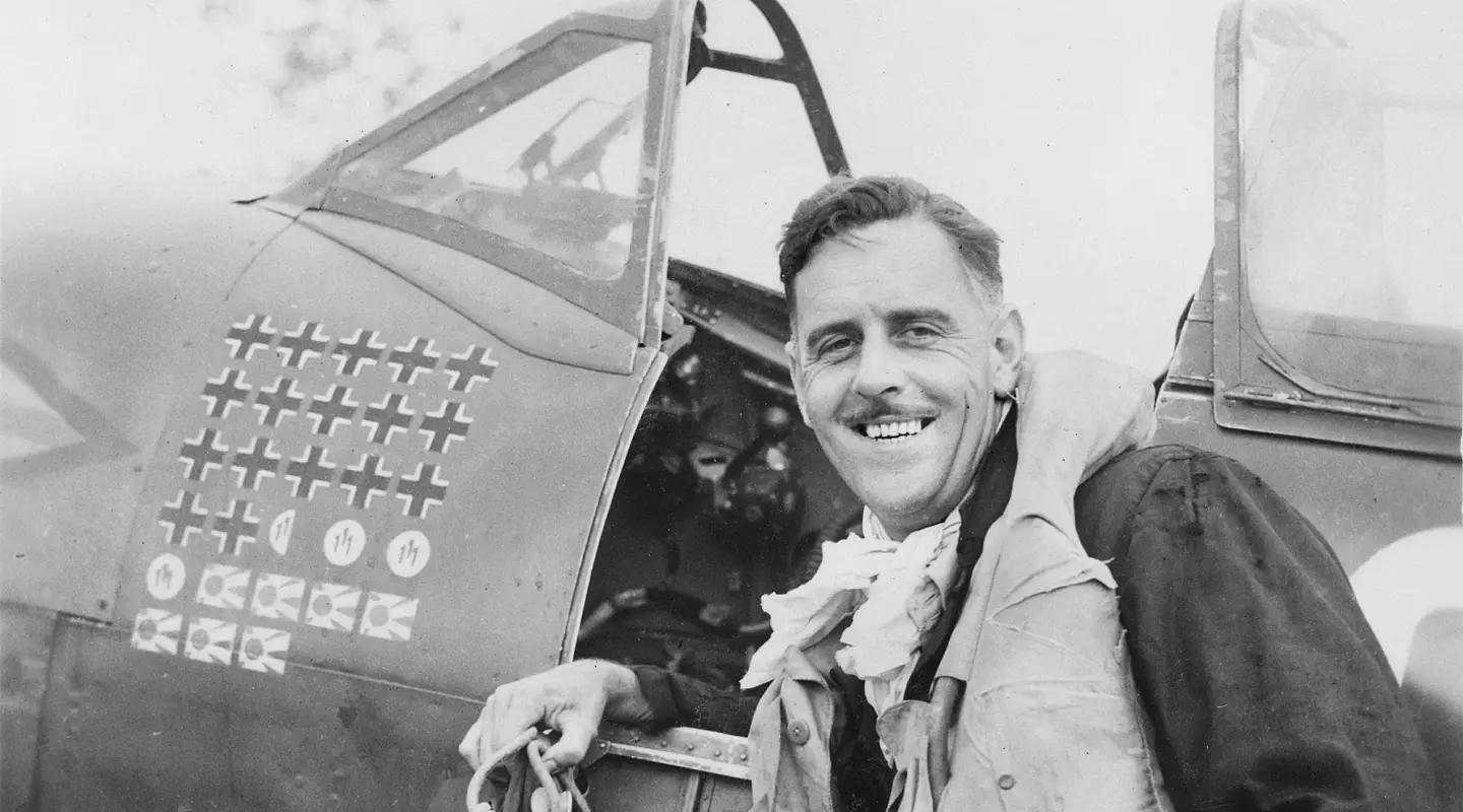 Group Captain Clive Caldwell with his Supermarine Spitfire MK VIII