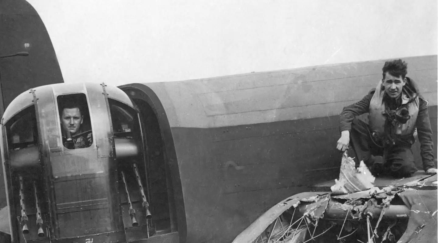 Flight Sergeant J. Venning in the turret of a Lancaster Bomber