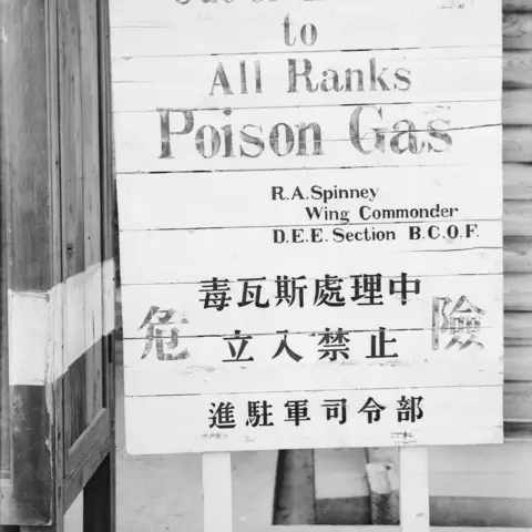 A notice in English and Japanese reads Out of Bounds to all ranks, Poison Gas.