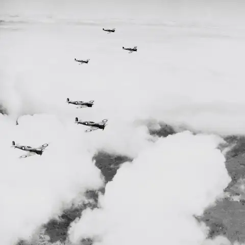 Spitfire Squadrons practice formation flying at an Australian base.