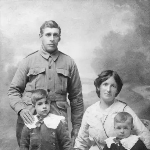 Private Alfred Lovett with his wife Sarah and two sons, 1915.