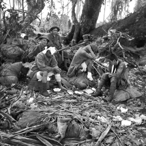 Wounded Japanese soldiers captured in the final Australian assault on Gona, Papua, 17 December 1942. AWM 013879
