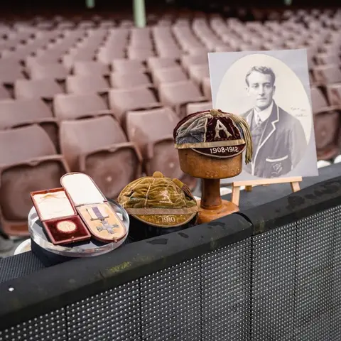 A collection of Tom Richards' honours: (L-R): 1908 Olympic gold medal, Military Cross, 1910 Lions cap, Wallabies cap (1908-1912) and his portrait