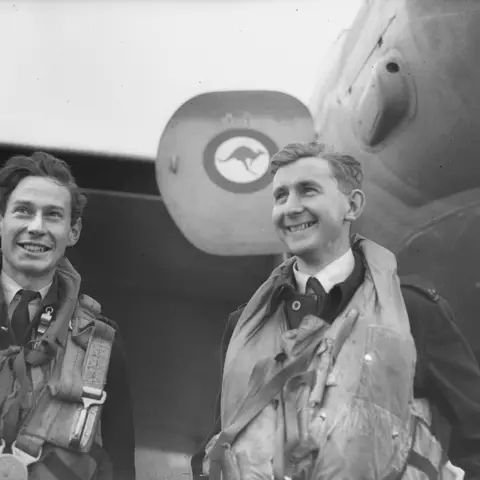 SUSSEX, ENGLAND. 1944-06-06. 410343 FLYING OFFICER (FO) W. A. H. KELLETT, ESSENDON, VIC, NAVIGATOR AND 400739 FO F. S. STEVENS, SURREY HILLS, VIC, PILOT, WHO SHOT DOWN TWO OF THE FOUR ENEMY AIRCRAFT CLAIMED BY NO. 456 (MOSQUITO) SQUADRON RAAF, BASED AT RAF STATION FORD, ON THE NIGHT OF D-DAY. AWM UK1437