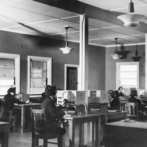 WRANS at work in the wireless telegraphy room, HMAS Harman.