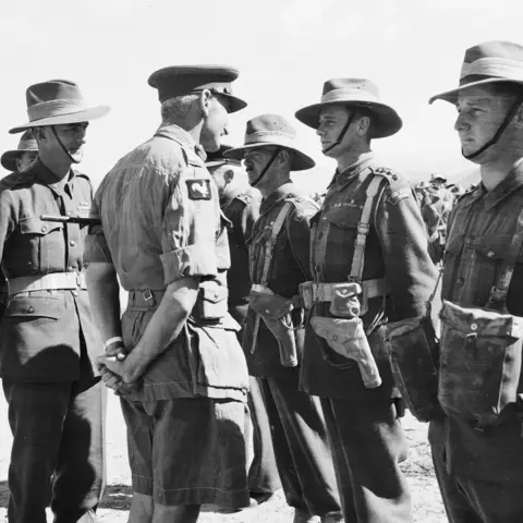 30 September 1950. Lieutenant Colonel Charles Green introduces officers of 3RAR to Brigadier Aubrey Coad at Taegu. AWM 146906