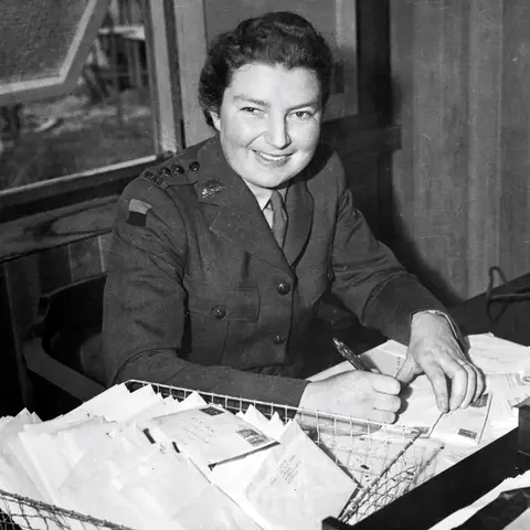 Lieutenant Thelma Long, Australian Women’s Army Service, censoring mail, 1942. AWM P00576.001