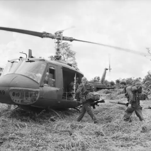 7RAR move into a No. 9 Squadron Iroquois helicopter. Vietnam 1967
