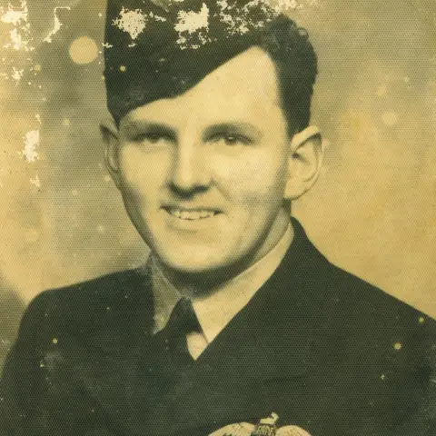 Studio portrait of Squadron Leader Charles Joseph Merryfull (later MBE) RAAF.