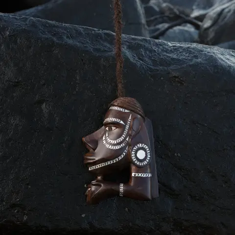 Nguzu nguzu suspended over a rock formation by coconut fibre rope