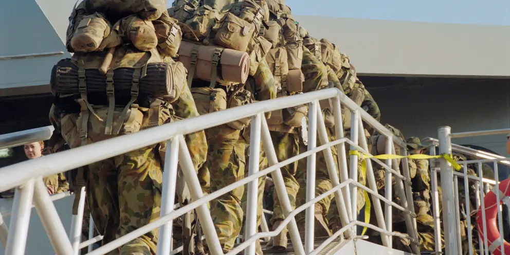 Members of 3rd Combat Engineers Regiment, bound for East Timor, board HMAS Jervis Bay.