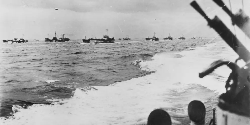 Landing craft and ships carrying British troops head toward Normandy