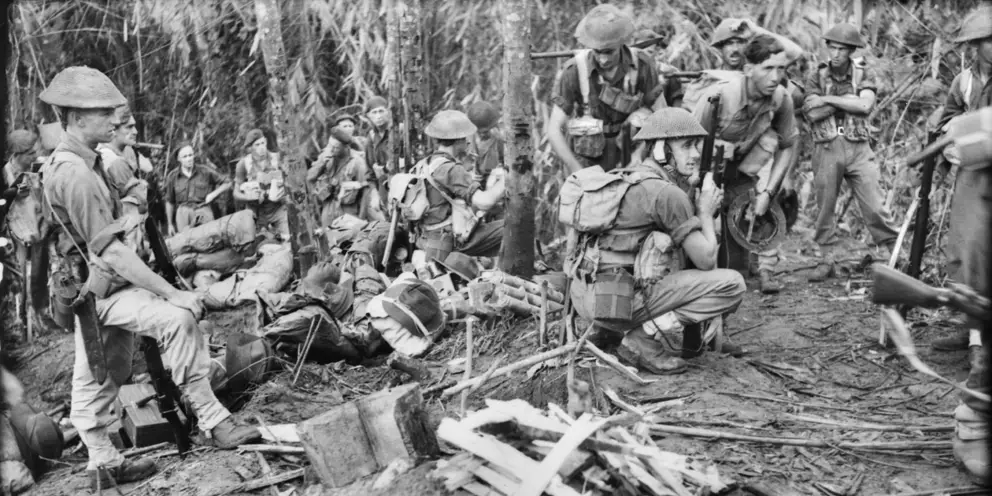 Members of the 9th Battalion preparing to attack Japanese positions on Little George Hill, Bougainville, 1944