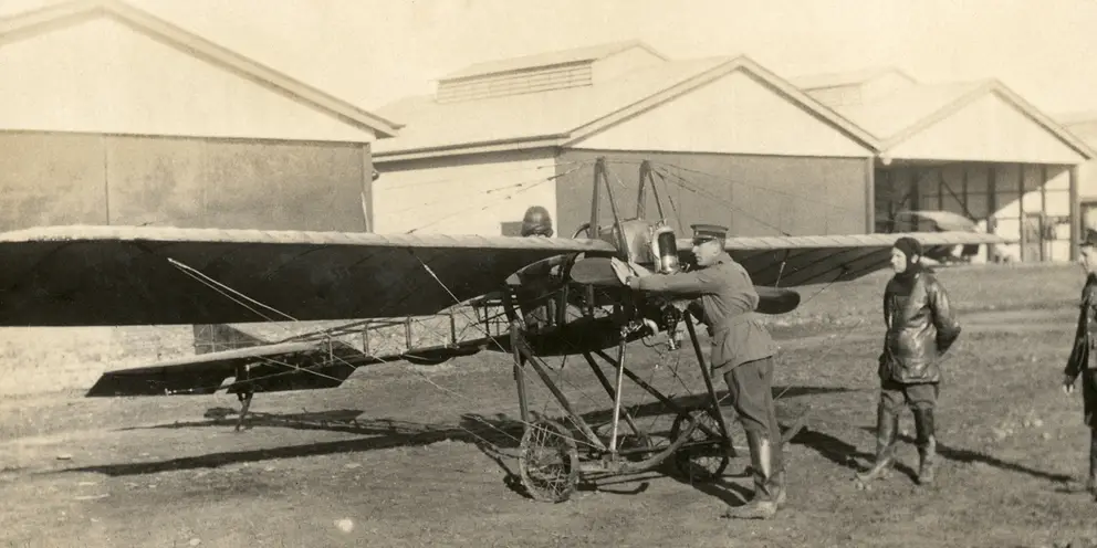 Members of the Australian Flying Corps prepare a Deperdussin training aircraft for take-off.