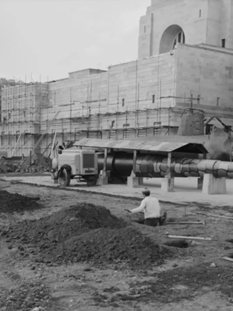 Preliminary works have just commenced as workmen prepare the site for the construction of the extensions to the AWM main building undertaken between 1968 and 1970. 