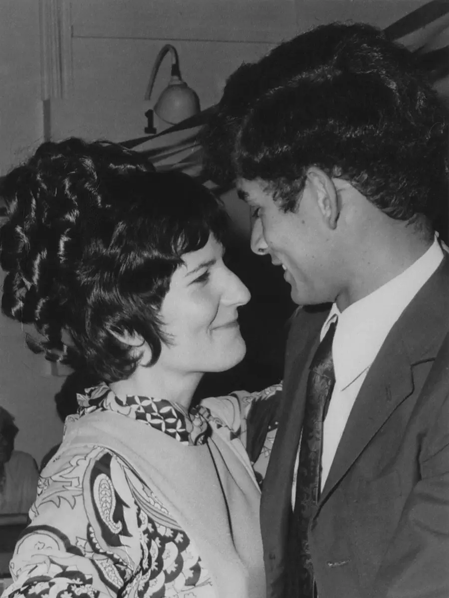 Angela and her husband dancing