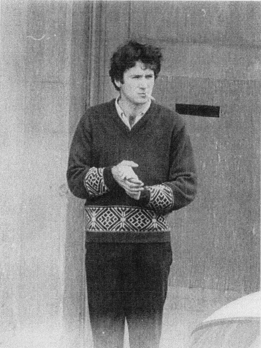 Des Files smokes a cigarette