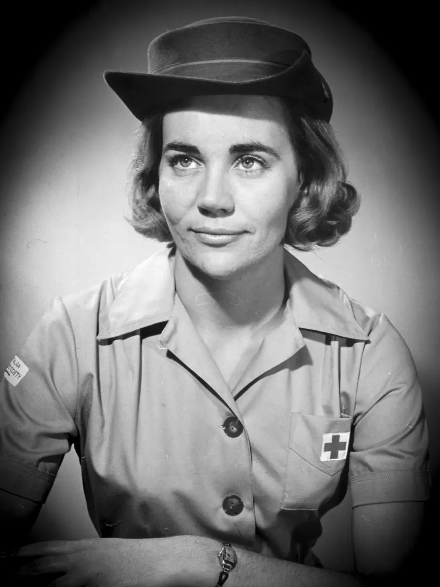 Studio portrait of Jean Matthews in her Red Cross uniform and hat