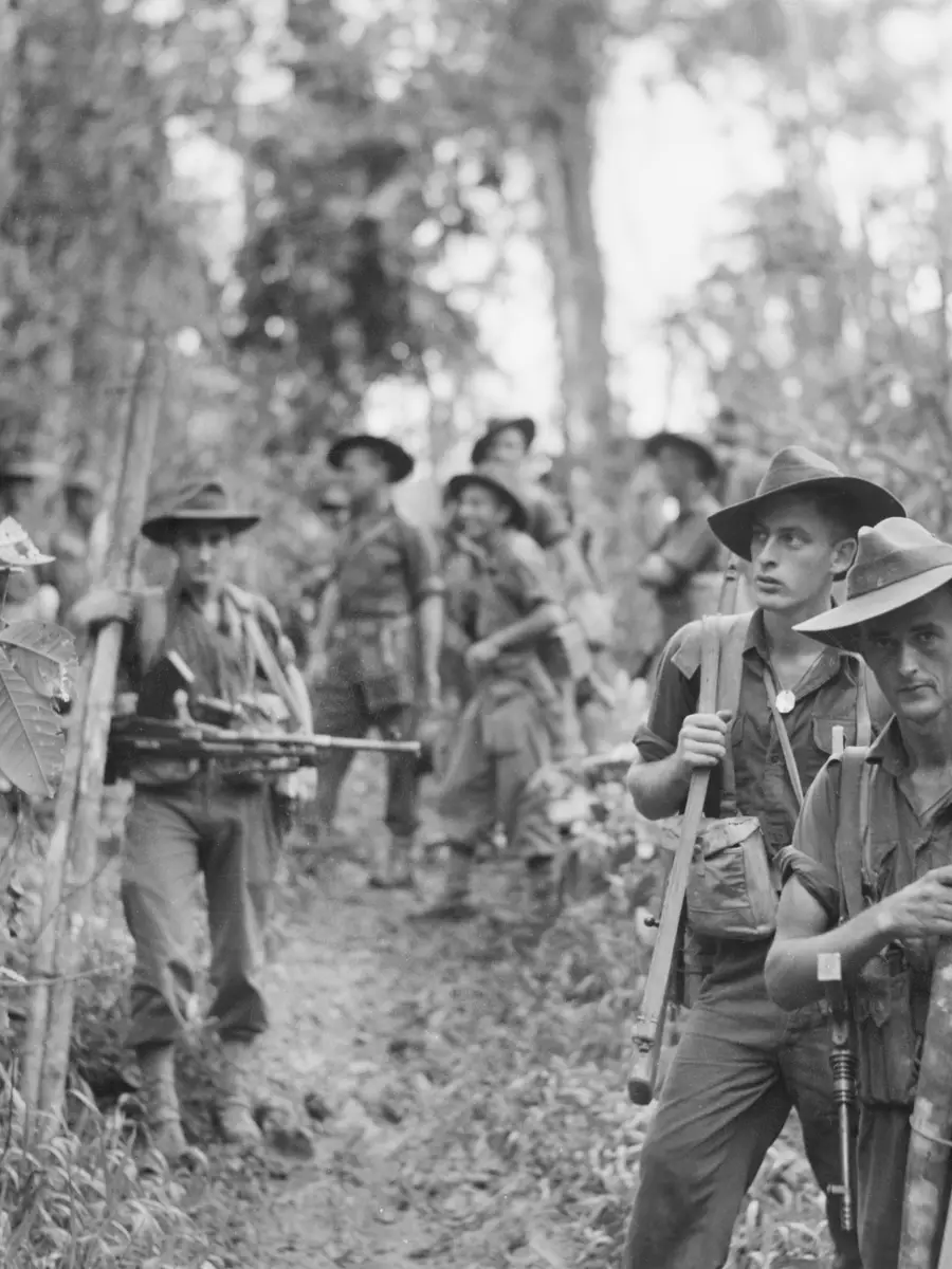 Soldiers of the 2/8th Battalion prepare to attack Japanese defences on Mount Shiburangu, near Wewak in June 1945