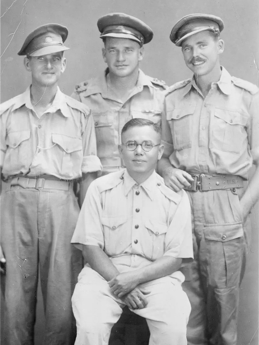 Boonpong Sirivejjabhandu (seated) with members of the Allied War Graves Commission