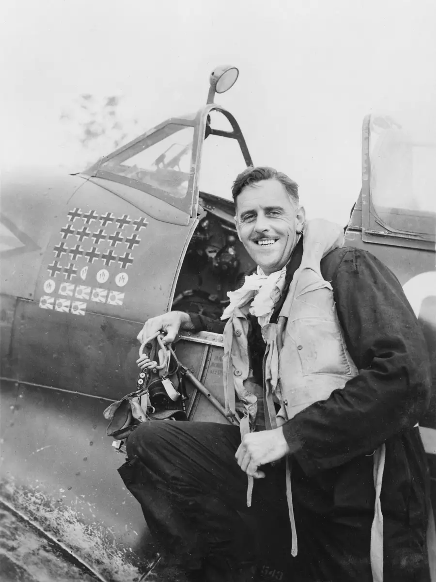 Group Captain Clive Caldwell with his Supermarine Spitfire MK VIII