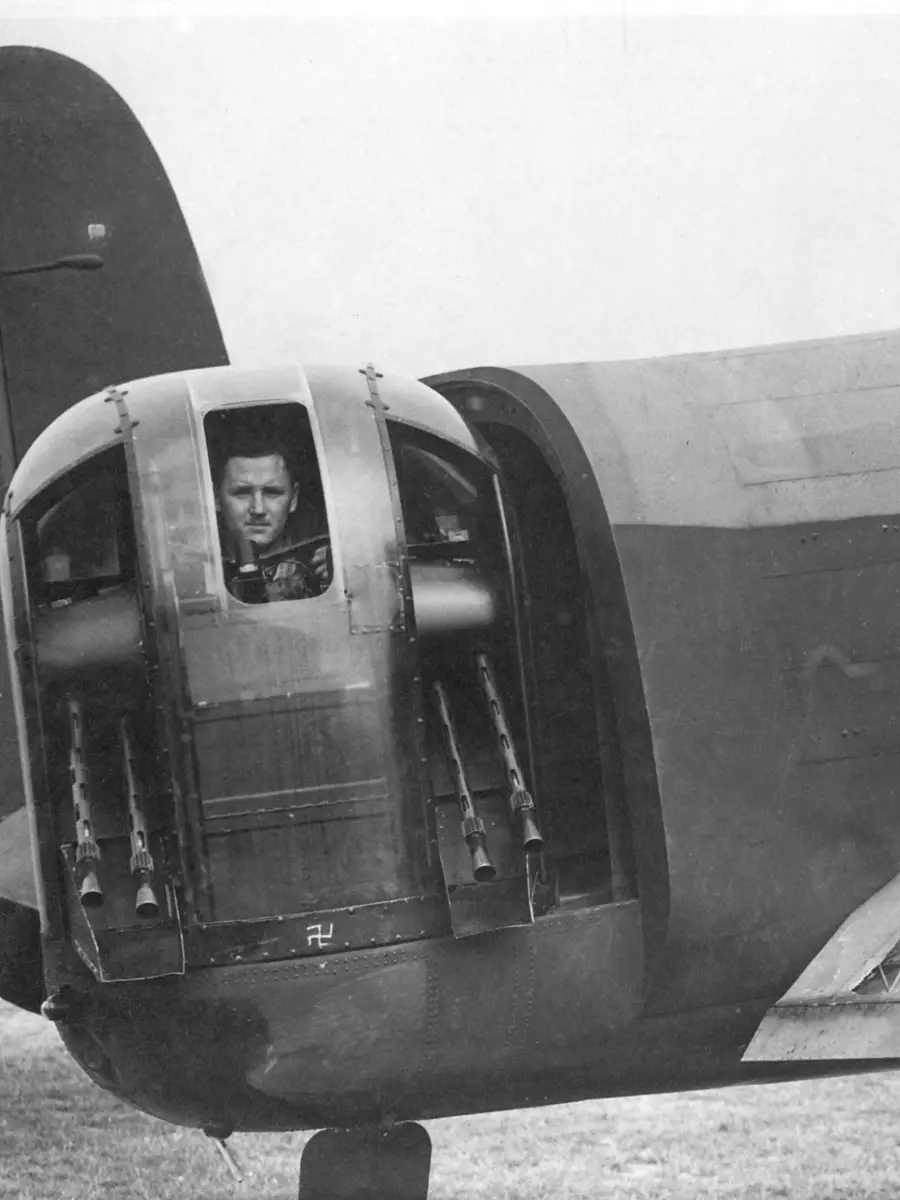 Flight Sergeant J. Venning in the turret of a Lancaster Bomber