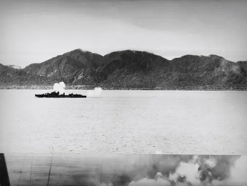 HMAS Arunta unleashes its firepower on Japanese positions at Aitape, New Guinea, July 1944.