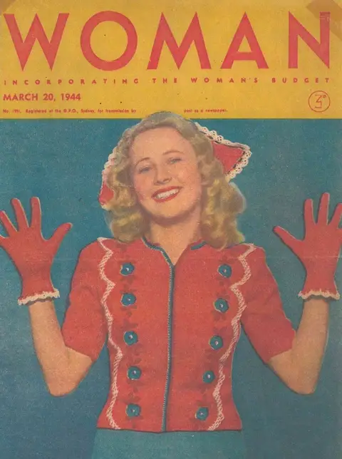 Astrid on the cover of Woman magazine, March 1944. She wears a matching red sweater and glove set.