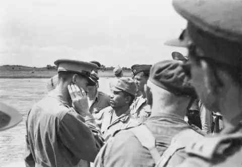 Members of the British Army Aid Group