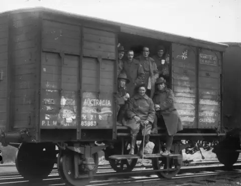Australian troops leaving Bray in France on 10 October 1918 AWME03534