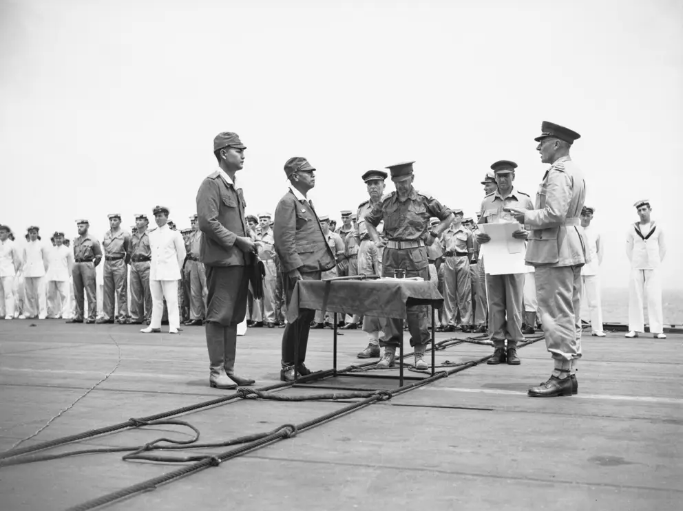 SURRENDER CEREMONY ON BOARD THE AIRCRAFT CARRIER HMS GLORY