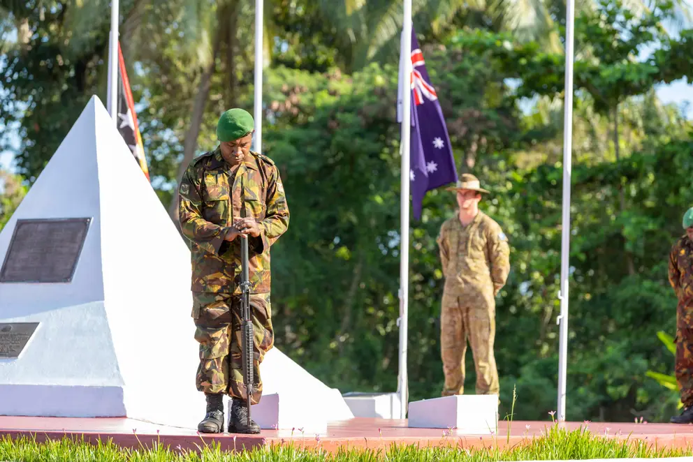 Papua New Guinean and Australian soldiers form the catafalque party during the commemoration ceremony. 