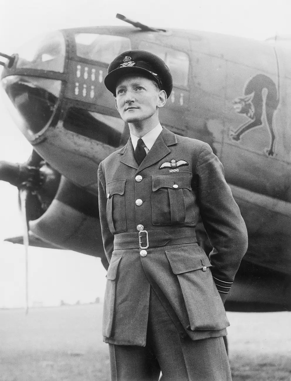 NORFOLK, ENGLAND. 1943-07-13. WING COMMANDER H. J. W. MEAKIN DFC, RAF, COMMANDING OFFICER OF A VENTURA NO. 464 SQUADRON RAAF, BASED AT RAF STATION METHWOLD, STANDING IN FRONT OF ONE OF THE SQUADRON AIRCRAFT. AWM UK0271