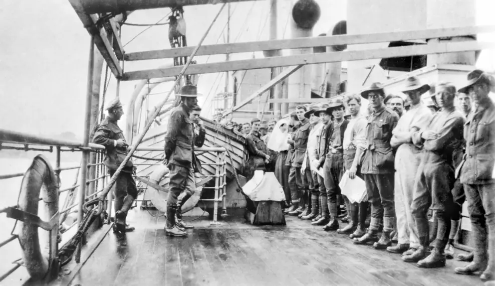 The deck of HMAT Derbyshire in February 1919, strict quarantine regime imposed by Australia to keep out the Spanish flu. AWM P01425.015