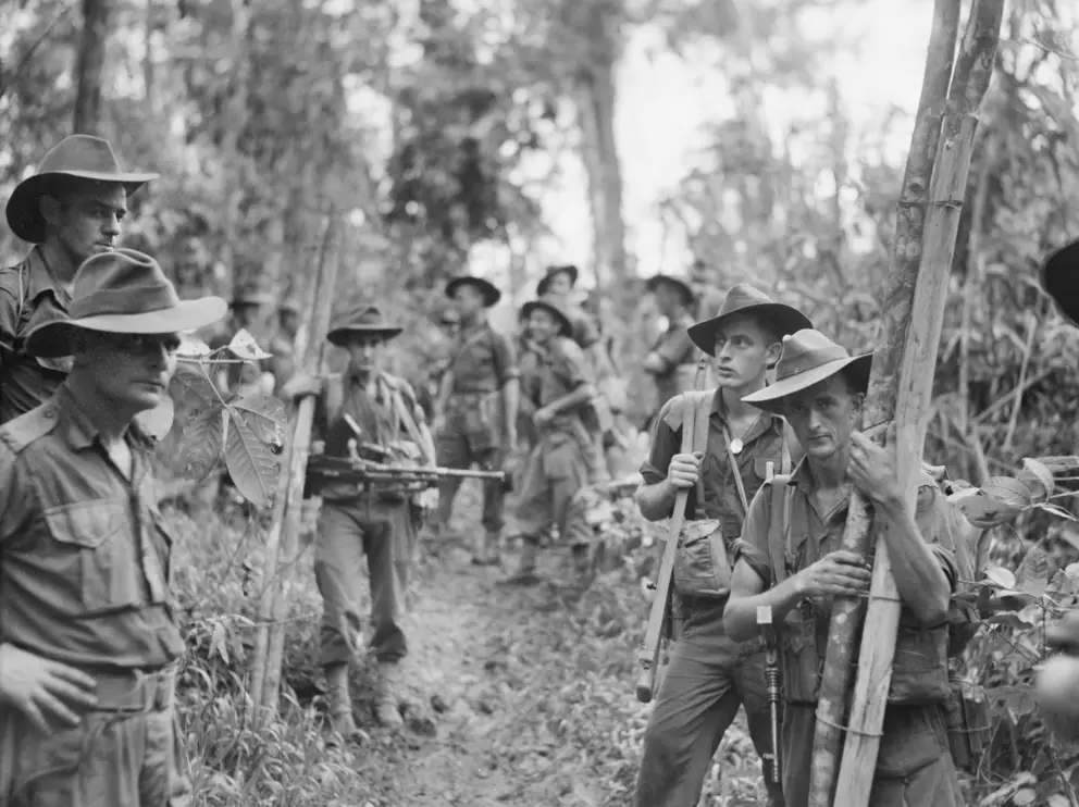 Soldiers of the 2/8th Battalion prepare to attack Japanese defences on Mount Shiburangu, near Wewak in June 1945