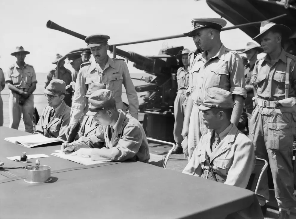 Brigadier John Stevenson oversees Lieutenant Naoomi Suzuki’s surrender of Japanese forces on Ocean Island