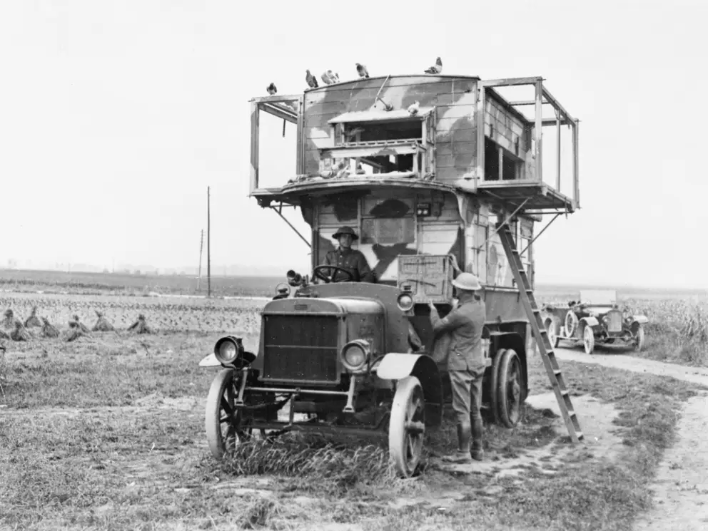 A motor bus from Putney, England, being used as a British Army mobile pigeon loft. 